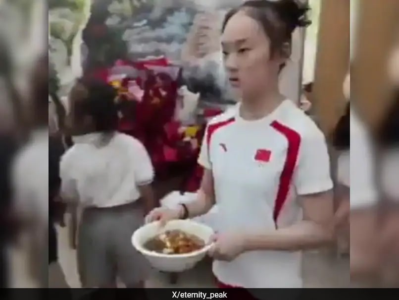 Olympic Gymnast Zhou Yaqin Serves Food at Family Restaurant